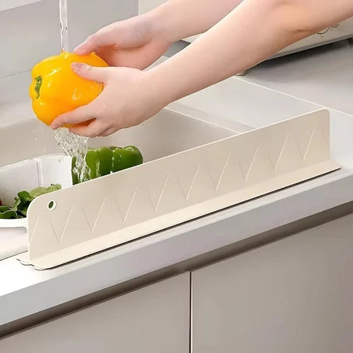 Splash guard for kitchen sink